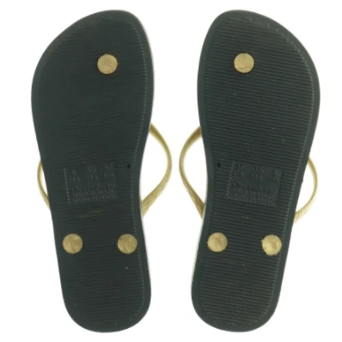 Guld og sorte flip-flops fra Ipanema (str. 37)