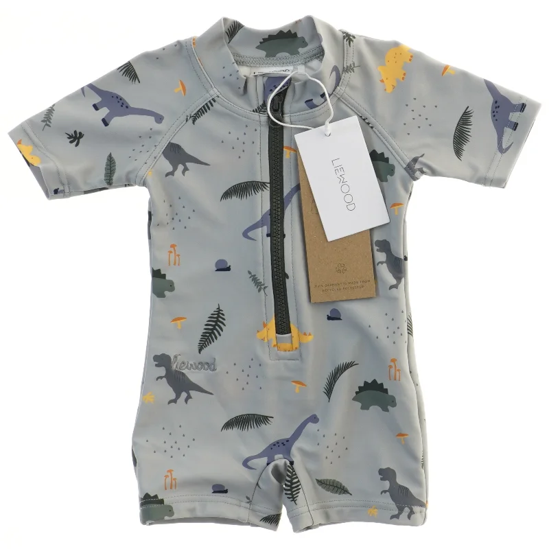 Ny UV-dragt med dinosaurprint fra Liewood (str. 62)