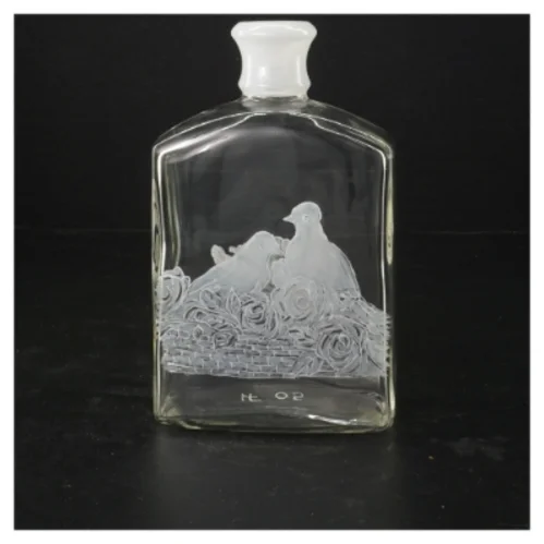 Dekoreret glasflaske (str. 4,5x10x18 cm)