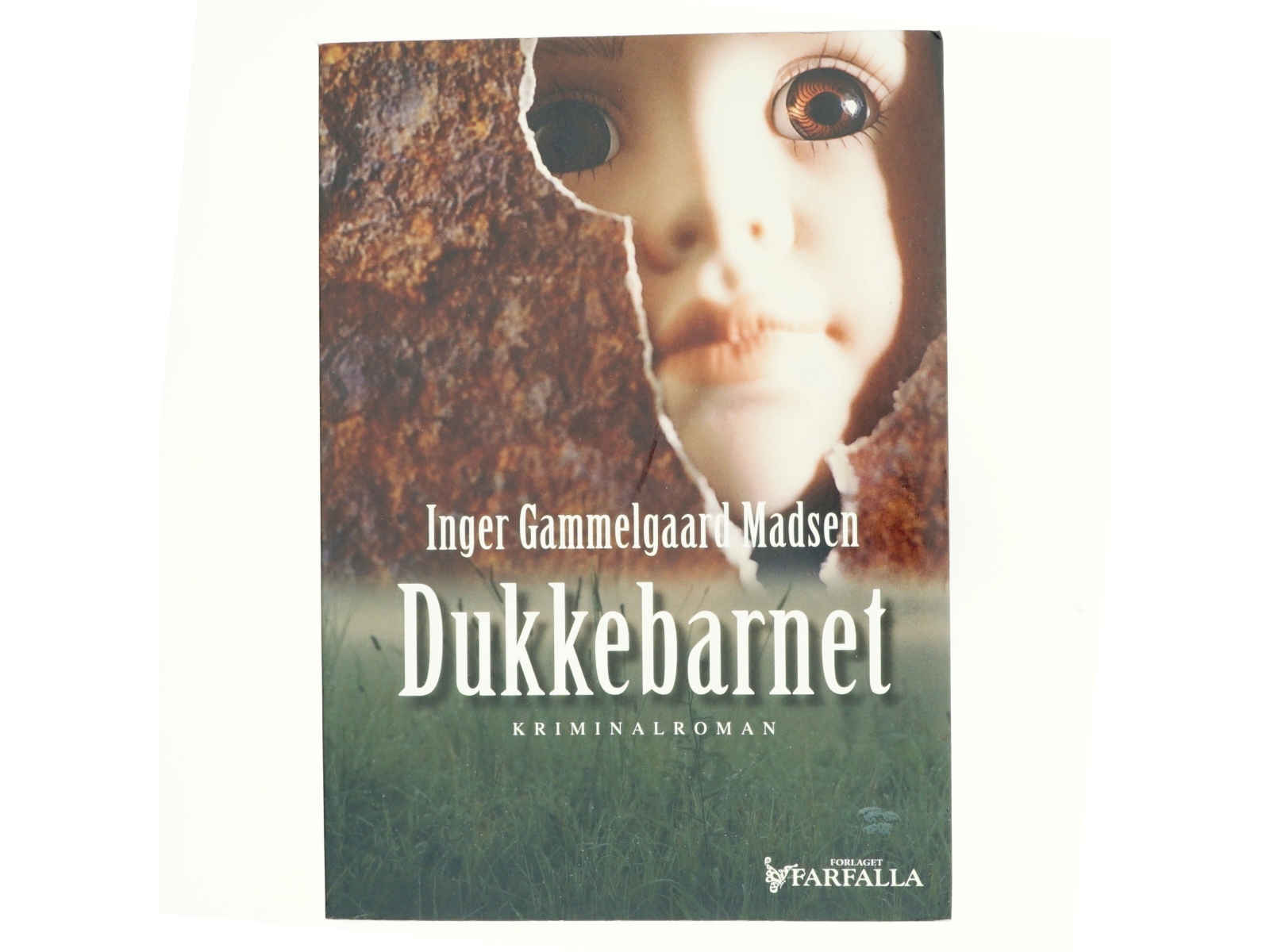 Dukkebarnet : kriminalroman af Inger Gammelgaard Madsen (Bog)