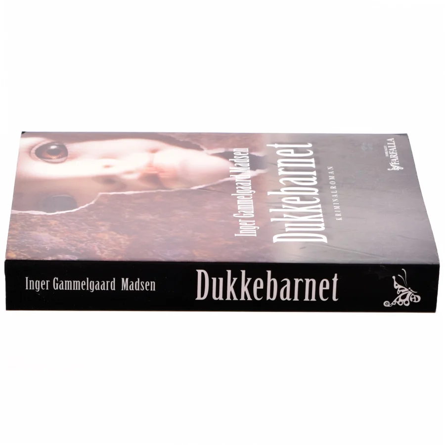 Dukkebarnet : kriminalroman af Inger Gammelgaard Madsen (Bog)
