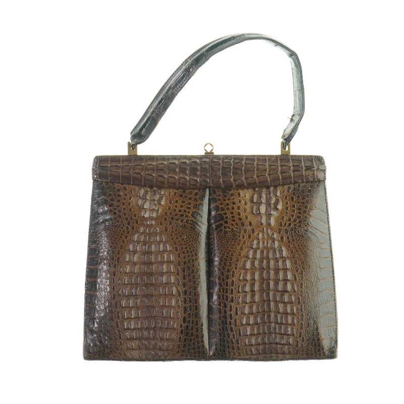 Håndtaske med slangeskind fra Mutans (str. LB 20x25 cm)