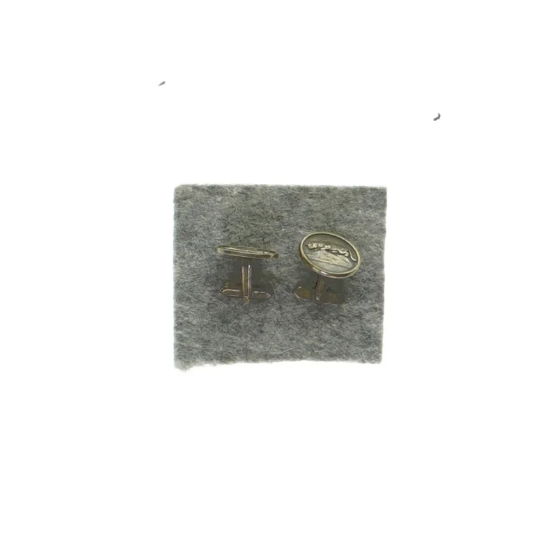 Manchetnapper med løvemotiv