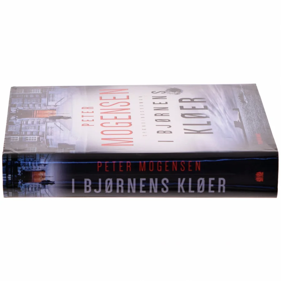 I bjørnens kløer : spændingsroman af Peter Mogensen (f. 1965-01-06) (Bog)