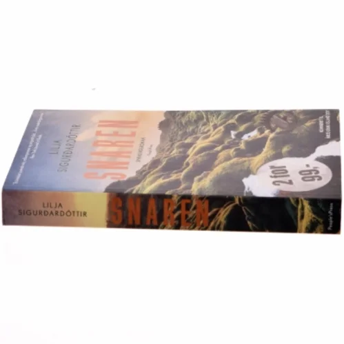 Snaren : spændingsroman af Lilja Sigurðardóttir (f. 1972) (Bog)