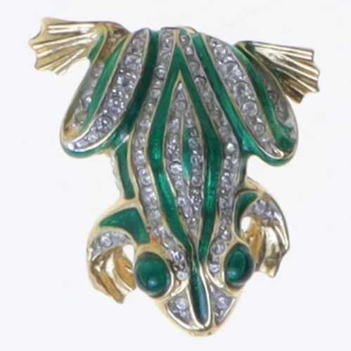 Broche med frø i guldfarvet metal (str. 3x3 cm)