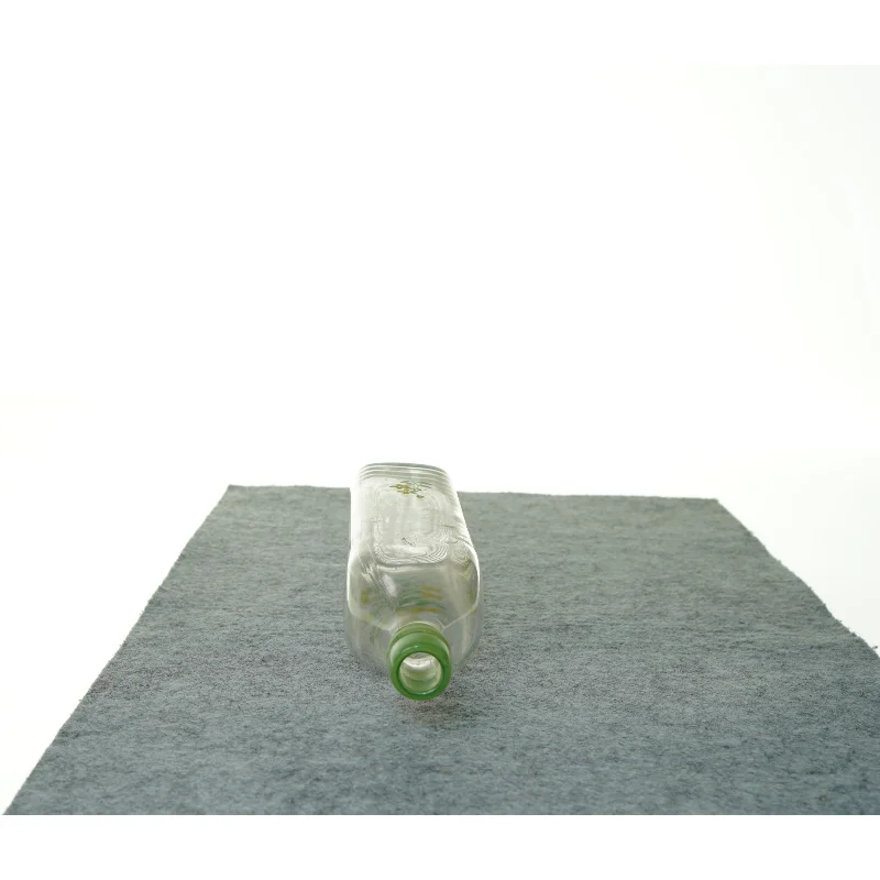 Gammel flaske vase med blomstermotiv (str. 27 x 7 cm)