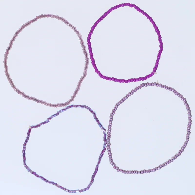 Sæt af perlearmbånd (str. Ø 6,5 cm)