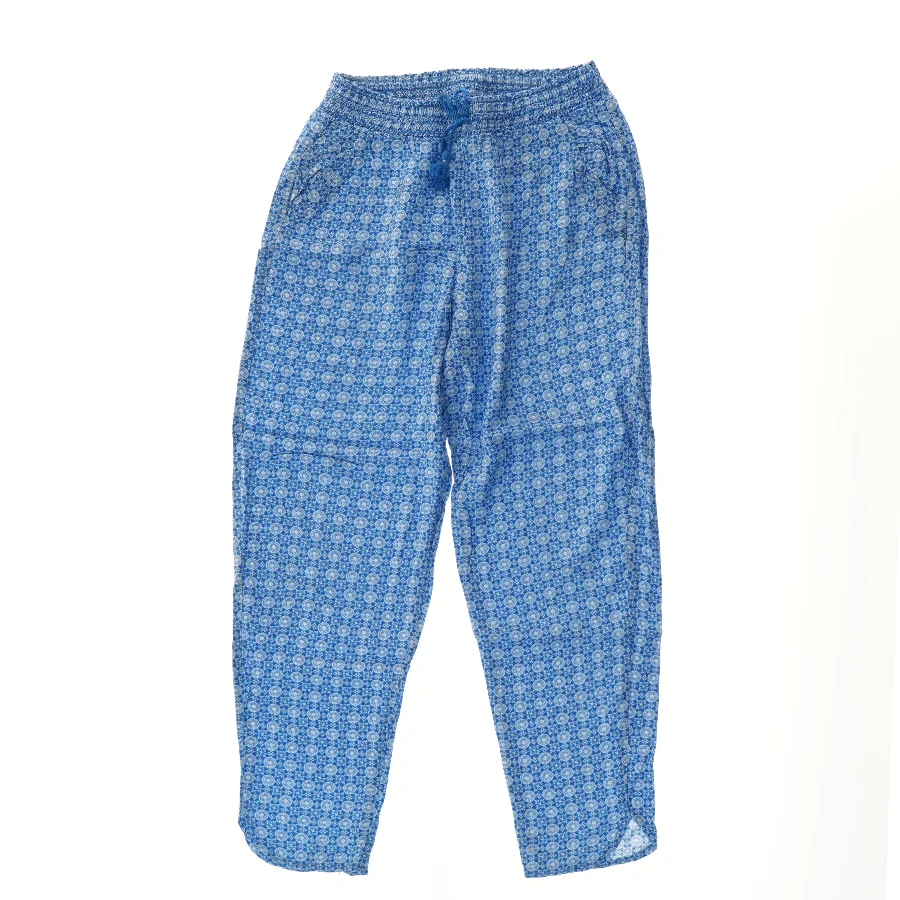 Coboltblå mønstrede bukser fra H&M (str. 140)