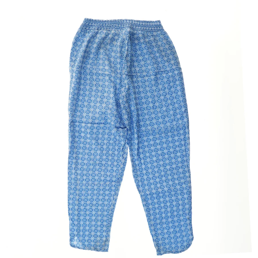 Coboltblå mønstrede bukser fra H&M (str. 140)