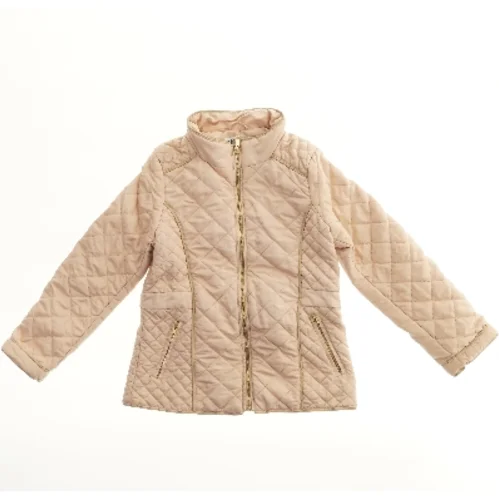 Vatteret jakke med lynlås fra H&M (str. 128)