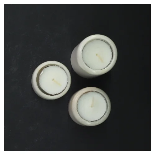 Sæt med tre hvide lysestager i marmor (str. 7,5, 5 og 2,5 cm)