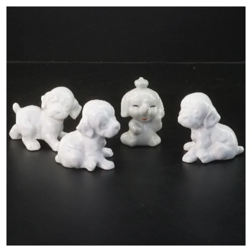 Porcelænsfigurer af hunde (str. 4 stk 6,5 cm)