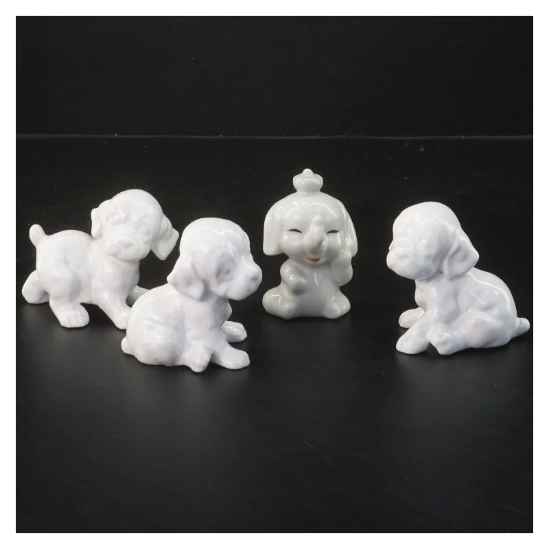 Porcelænsfigurer af hunde (str. 4 stk 6,5 cm)