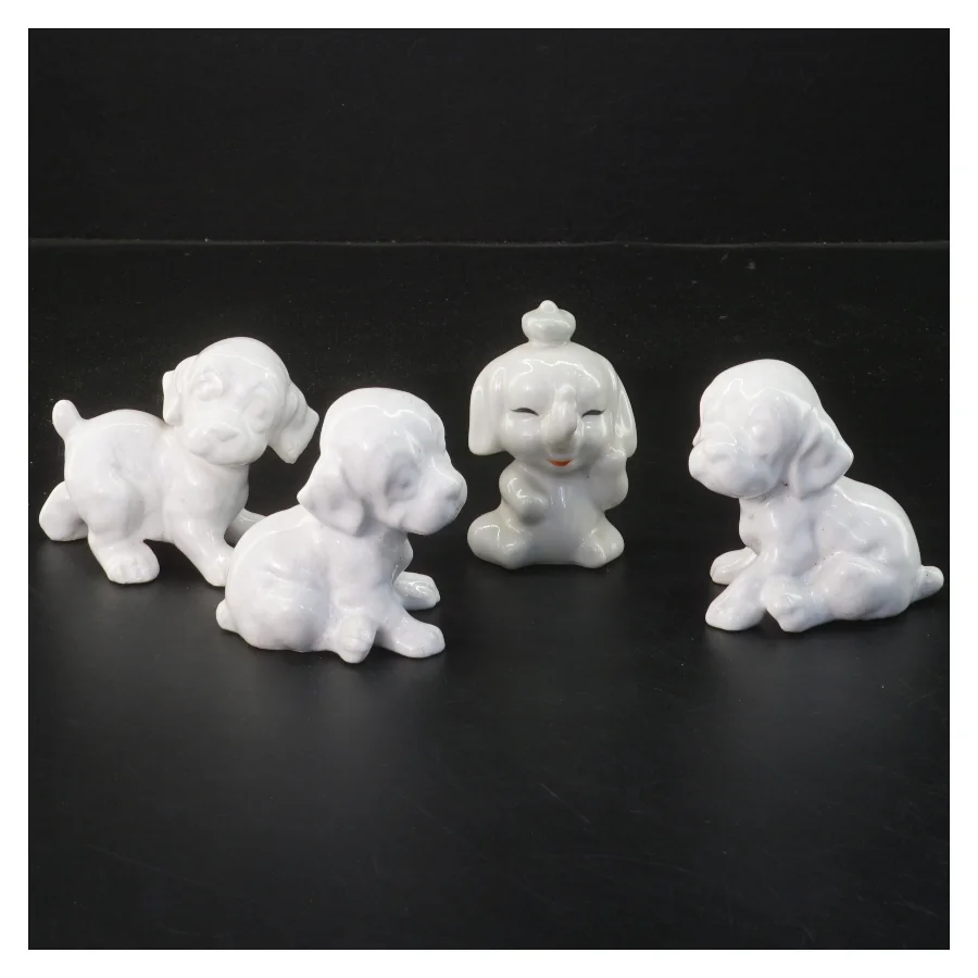 Porcelænsfigurer af hunde (str. 4 stk 6,5 cm)