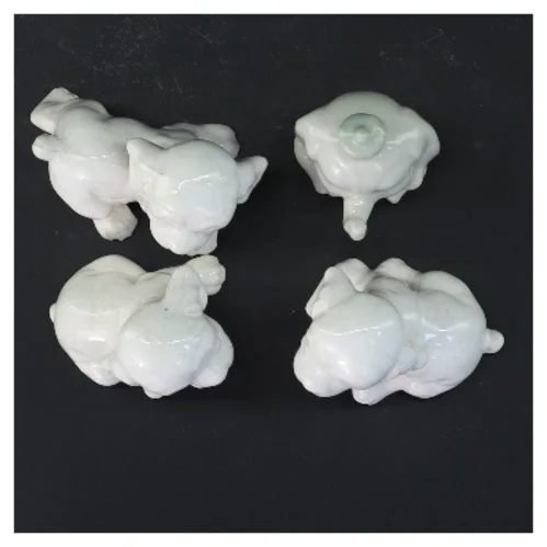 Porcelænsfigurer af hunde (str. 4 stk 6,5 cm)