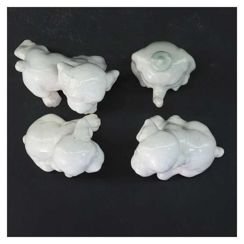 Porcelænsfigurer af hunde (str. 4 stk 6,5 cm)