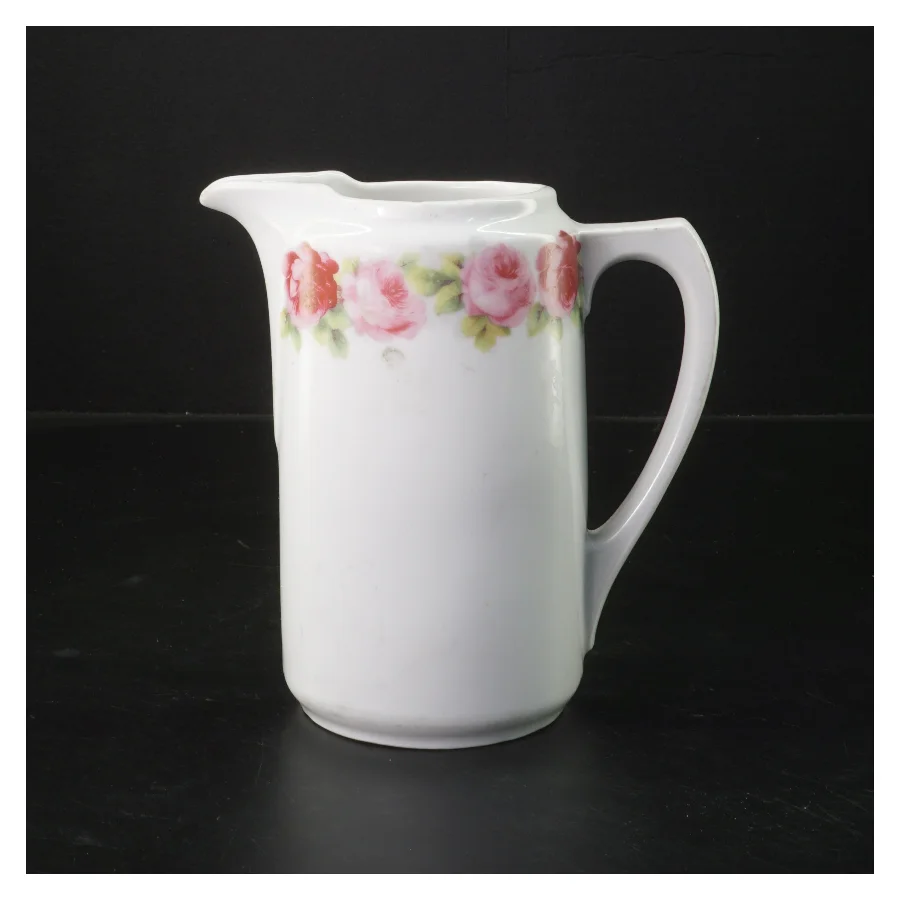 Hvid kande med blomstermønster (str. 16x9,5 cm)