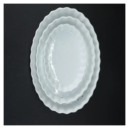 Ovale ildfaste fade med bølget kant fra Galzone (str. 27,5-18 cm)