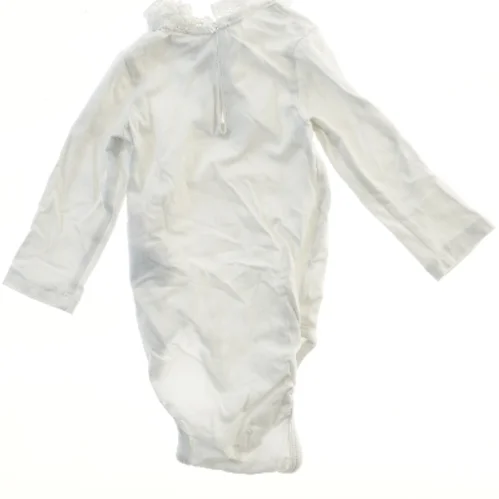 Hvid bodystocking med flæsekrave fra H&M (str. 62)