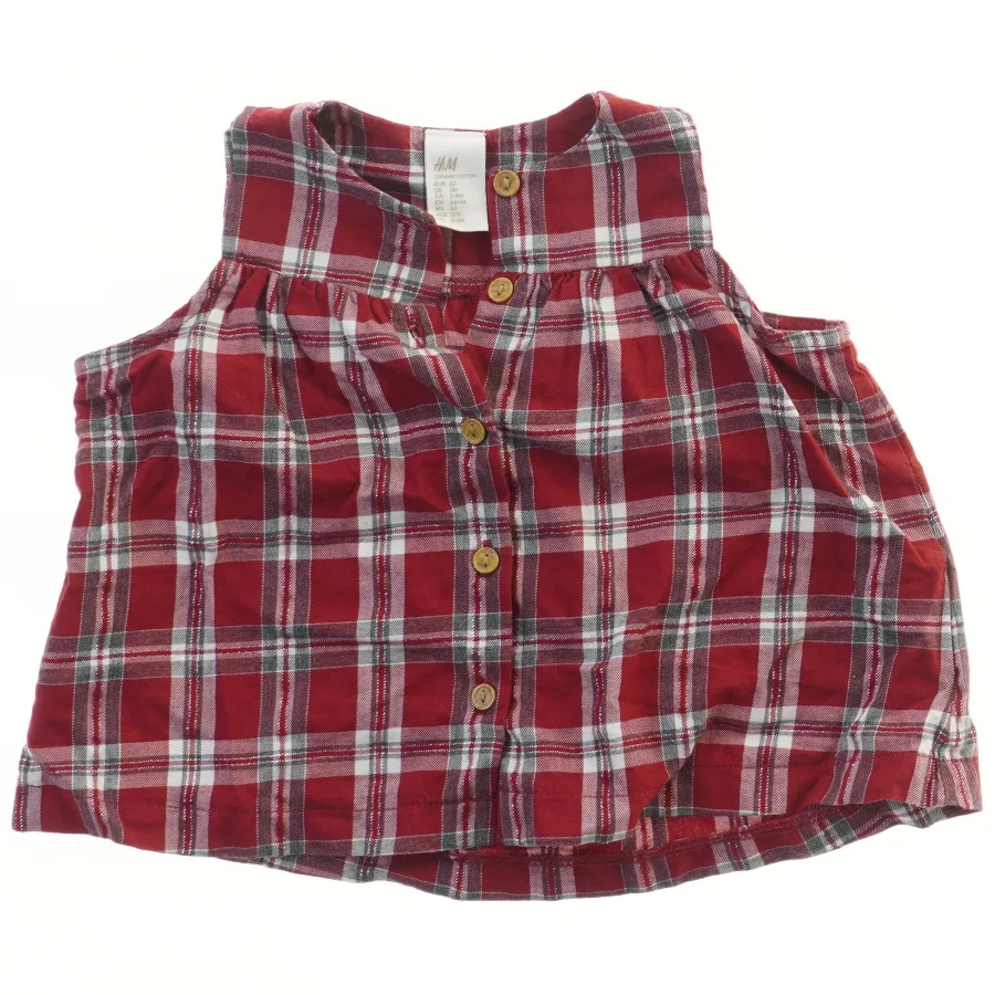 Ærmeløs kjole med tern fra H&M (str. 62)