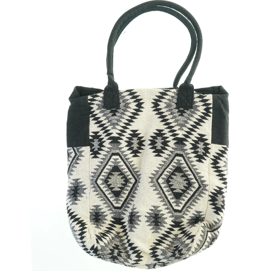 Mønstret skuldertaske fra Gina Tricot (str. 43x39 cm)