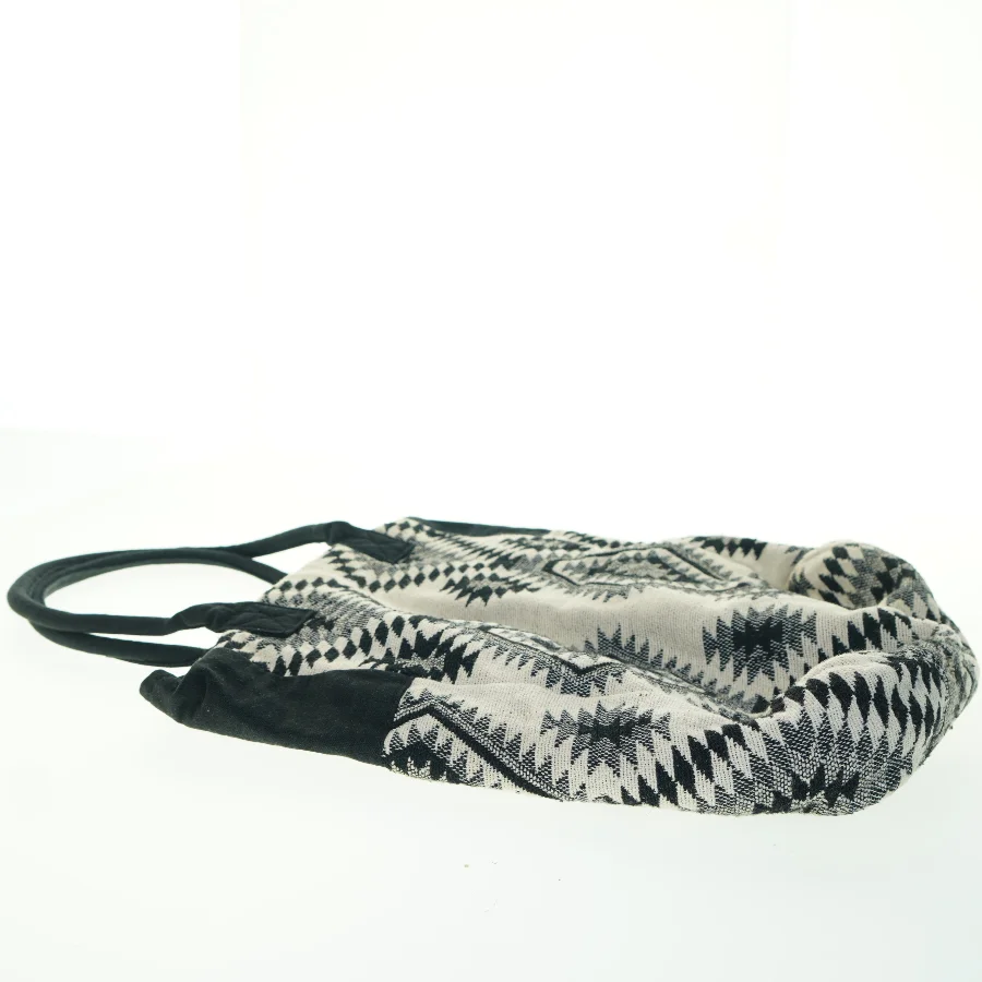 Mønstret skuldertaske fra Gina Tricot (str. 43x39 cm)