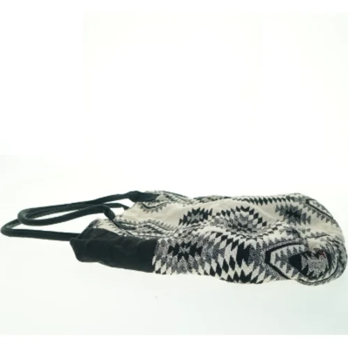 Mønstret skuldertaske fra Gina Tricot (str. 43x39 cm)