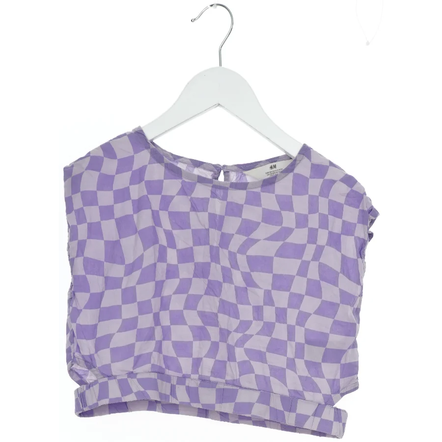 Kortærmet bluse med bølgemønster fra H&M (str. 134)