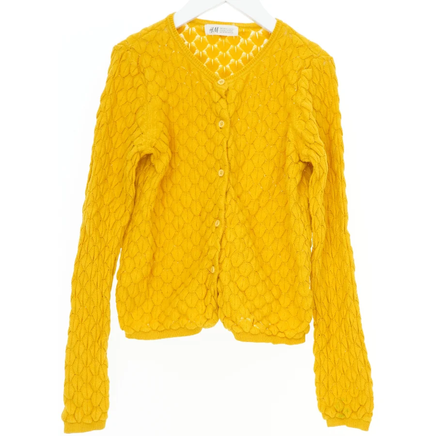 Gul cardigan med struktur fra H&M (str. 140)