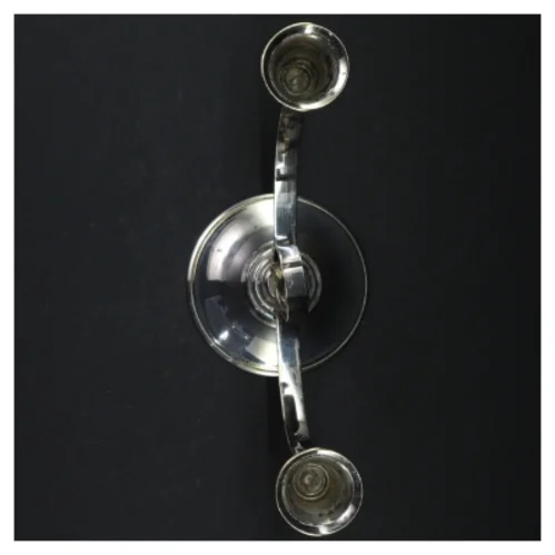 Sølvfarvet lysestage (str. H. 16 cm. b. 23 cm)