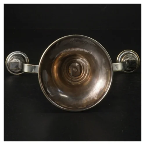 Sølvfarvet lysestage (str. H. 16 cm. b. 23 cm)