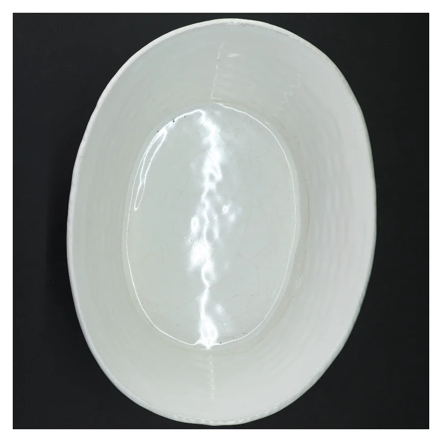 Hvid kurveflet porcelænsskål (str. 27 x 20 x 12 cm)