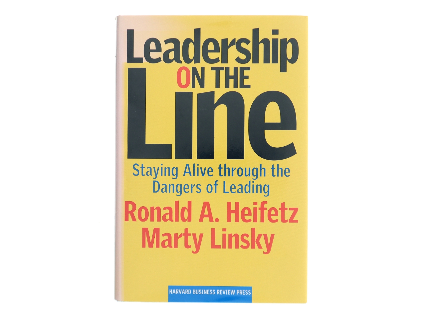 Leadership on the line : staying alive through the dangers of leading (Bog)