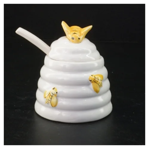 Honningkrukke med låg og ske (str. 10 komma 5 x 9 cm)