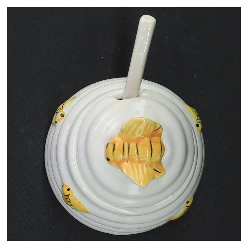 Honningkrukke med låg og ske (str. 10 komma 5 x 9 cm)