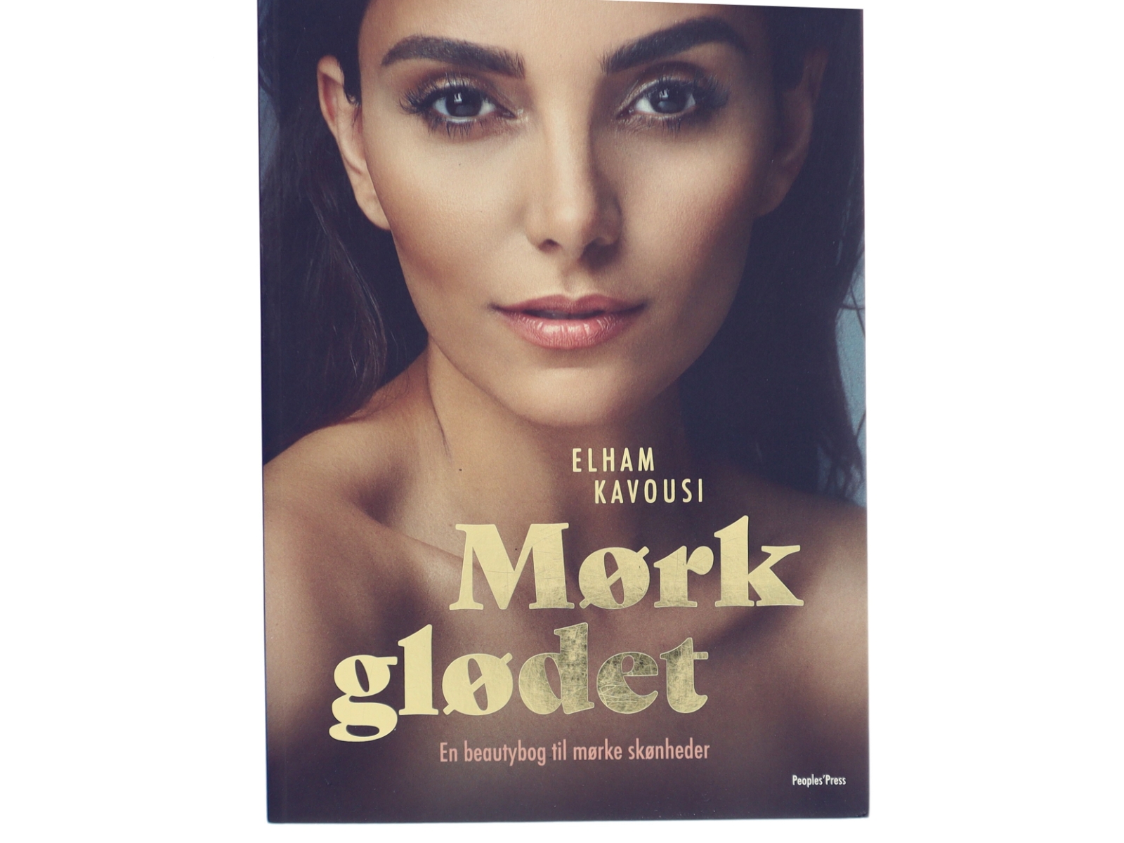 Mørkglødet : en beautybog til mørke skønheder af Elham Kavousi (Bog)