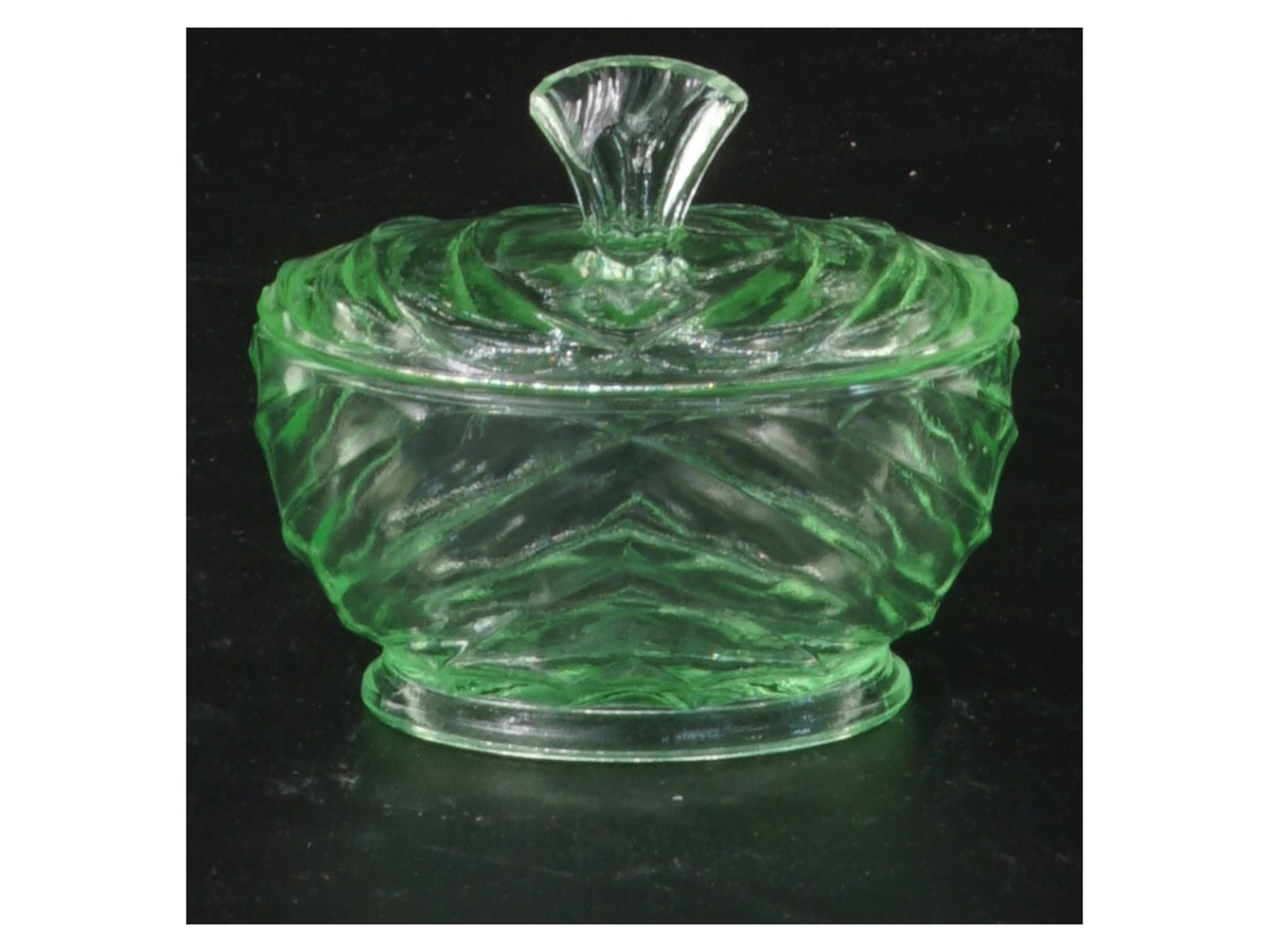 Oval Glas krukke med låg (str. 7x7 cm)