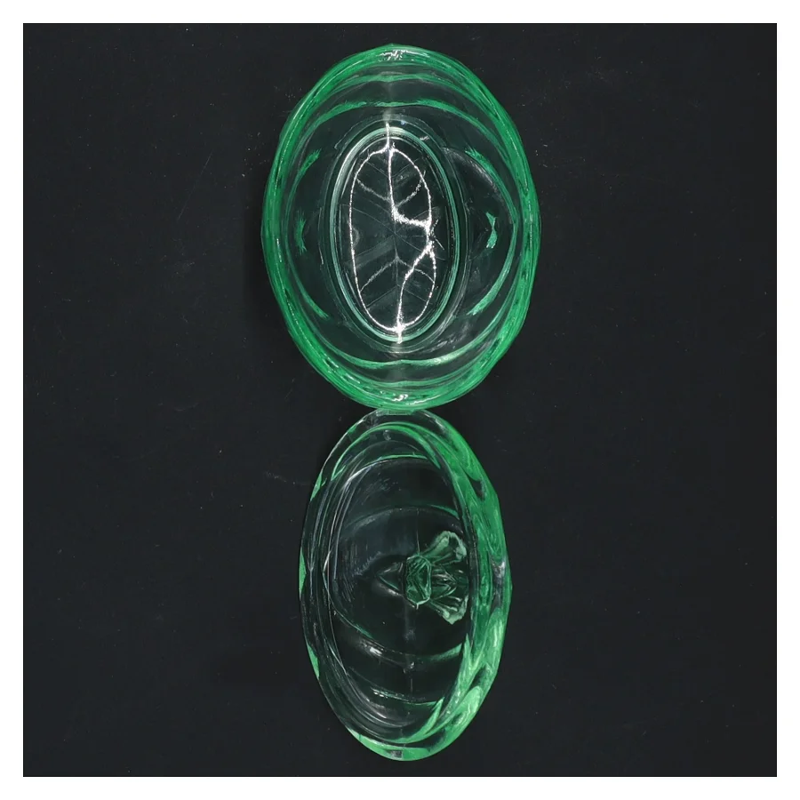 Oval Glas krukke med låg (str. 7x7 cm)