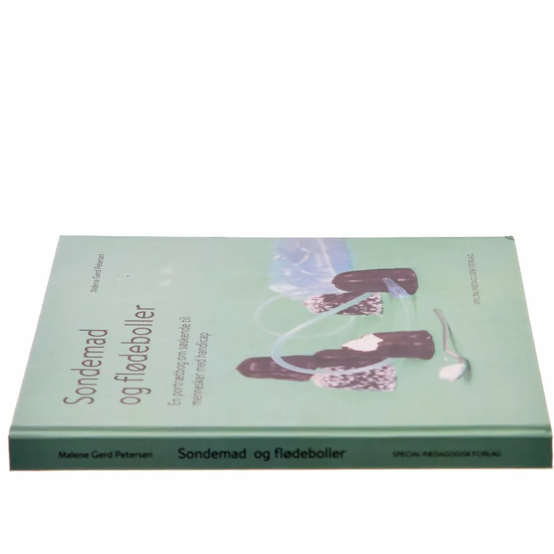 Sondemad og flødeboller : en portrætbog om søskende til mennesker med handicap af Malene Gerd Petersen (Bog)