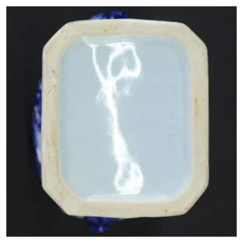 Porcelænsfigur med fad og blomster (str. 23 x 13 cm)