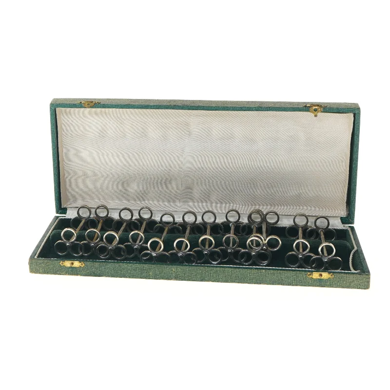 12 stk. Pletsølv franske 1930'er knivholdere (str. 33x13 cm)