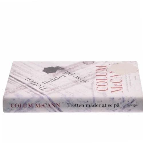 Tretten måder at se på : en roman og tre historier af Colum McCann (Bog)