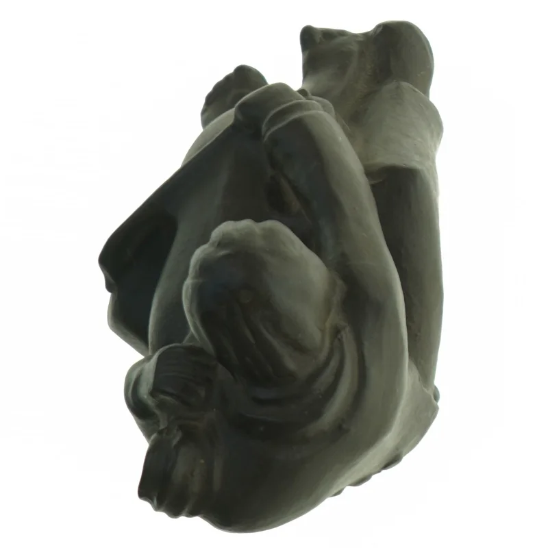 Skulptur af siddende figur (str. H. 18 cm. b. 13 cm)