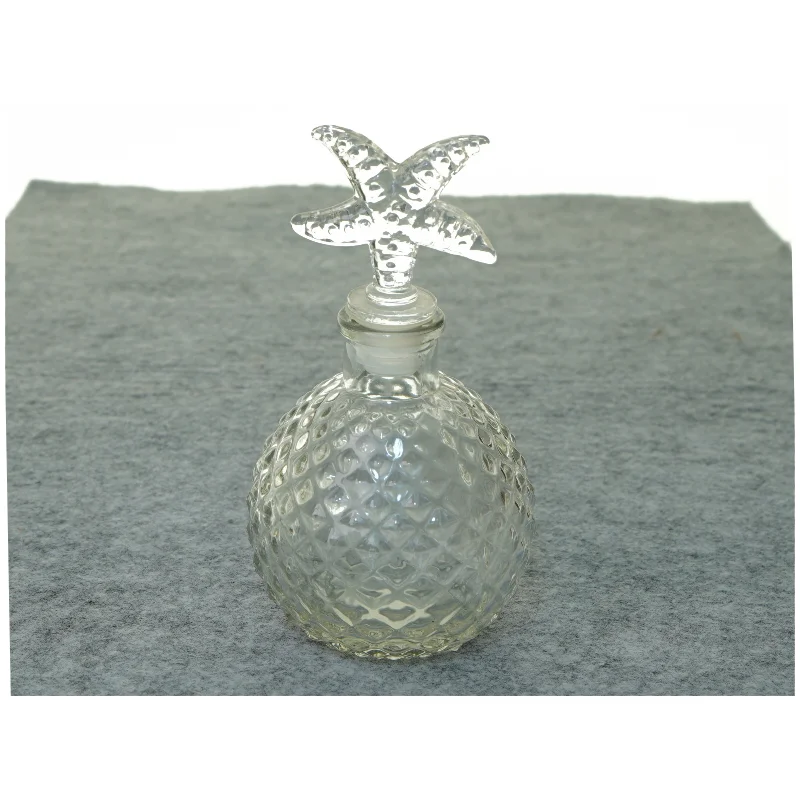 Glas karaffel flaske med søstjerne prop (str. 20 x 6 cm)