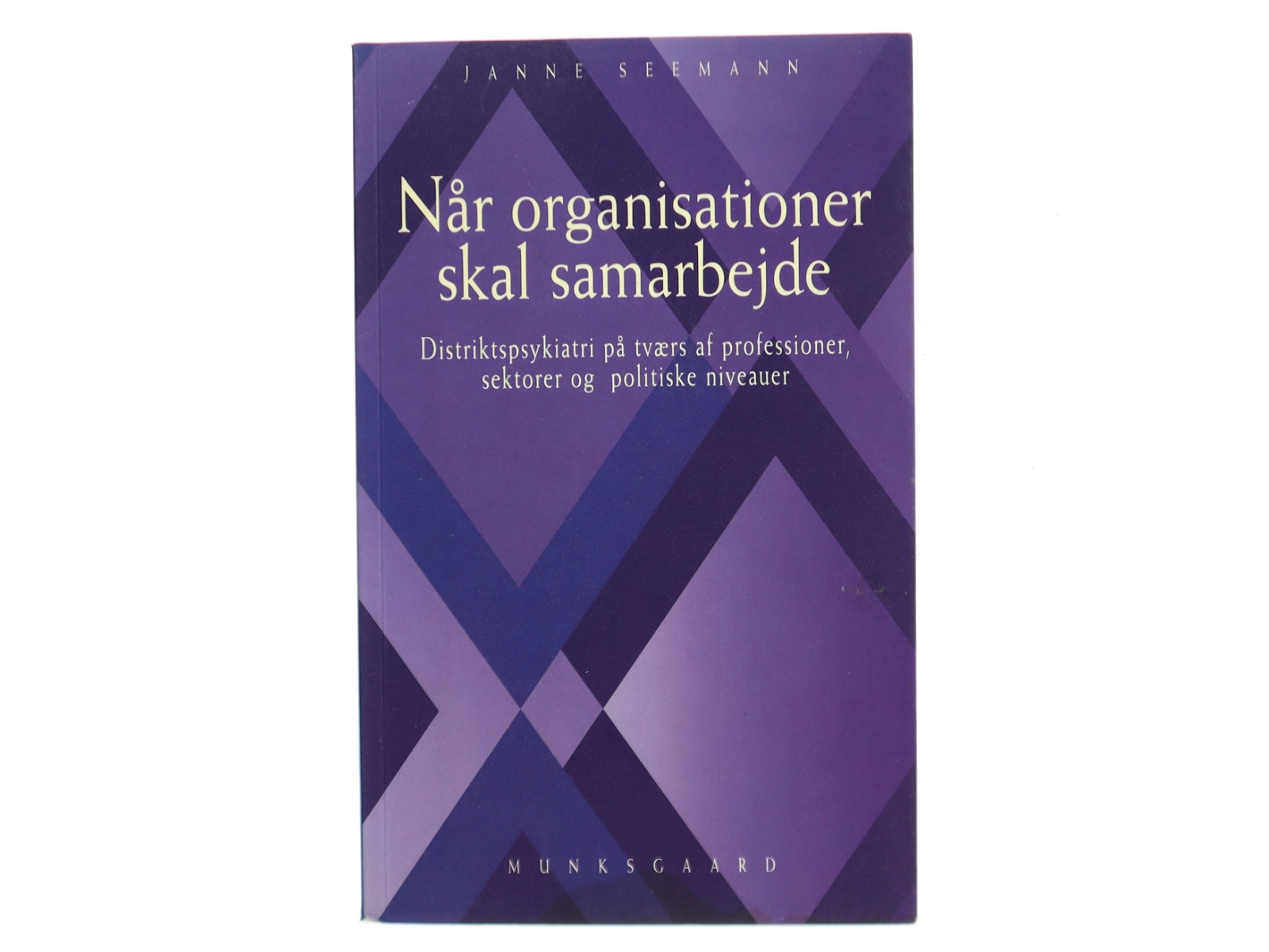 Når organisationer skal samarbejde : distriktspsykiatri på tværs af professioner, sektorer og politiske niveauer af Janne Seemann (Bog)