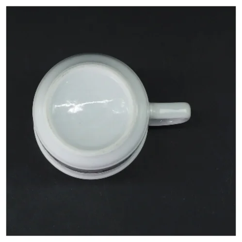 Porcelænskrus med tegneserie (str. Ø 7,5 cm højde 10 cm)