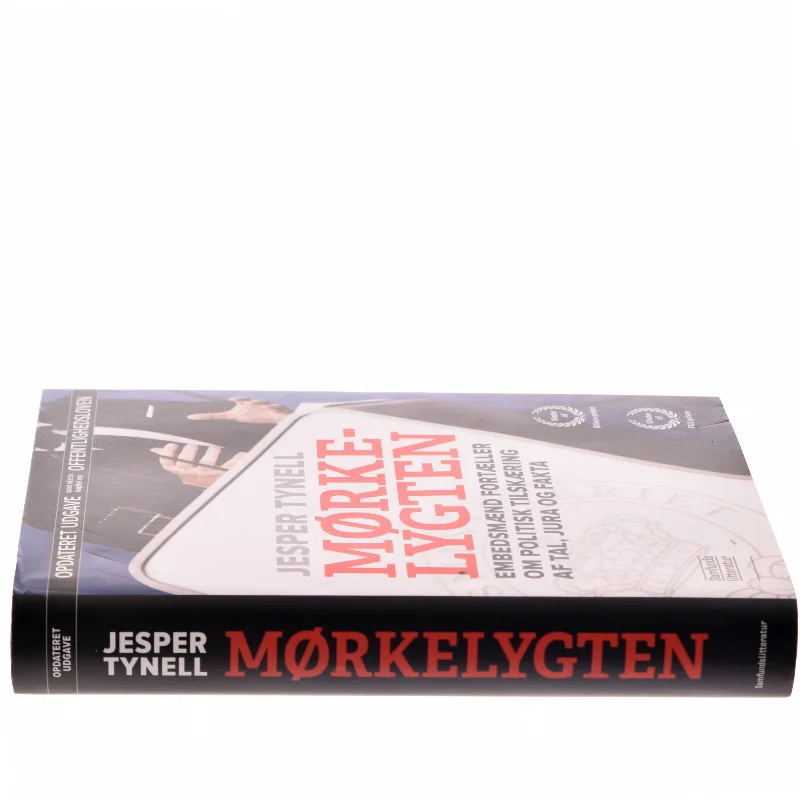 Mørkelygten : embedsmænd fortæller om politisk tilskæring af tal, jura og fakta af Jesper Tynell (Bog)