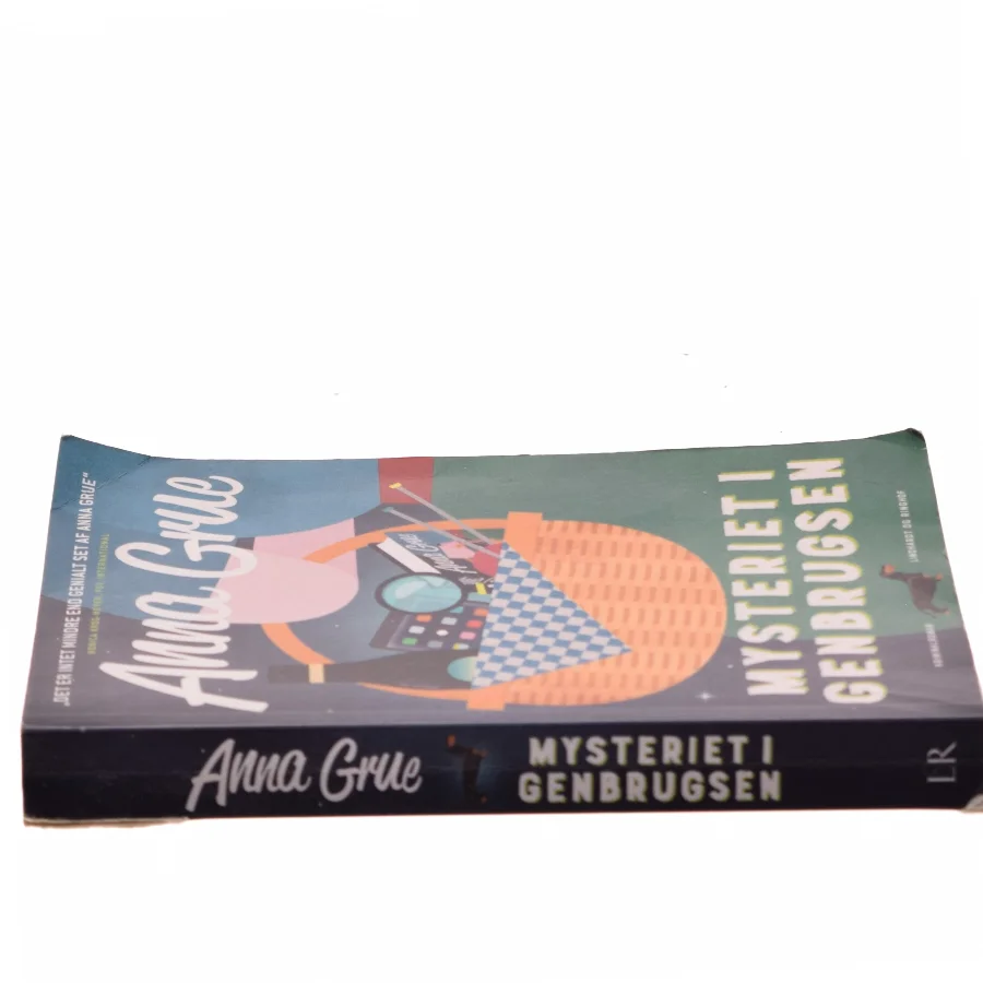 Mysteriet i Genbrugsen : kriminalroman af Anna Grue (Bog)