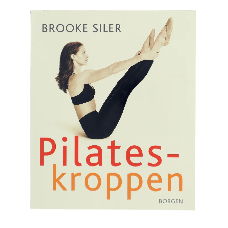 Pilates-kroppen : nøgle til personlig frigørelse : komplet vejledning i hvordan du selv kan gøre kroppen længere, stærkere og mere spændstig - uden maskiner af Brooke Siler (Bog)